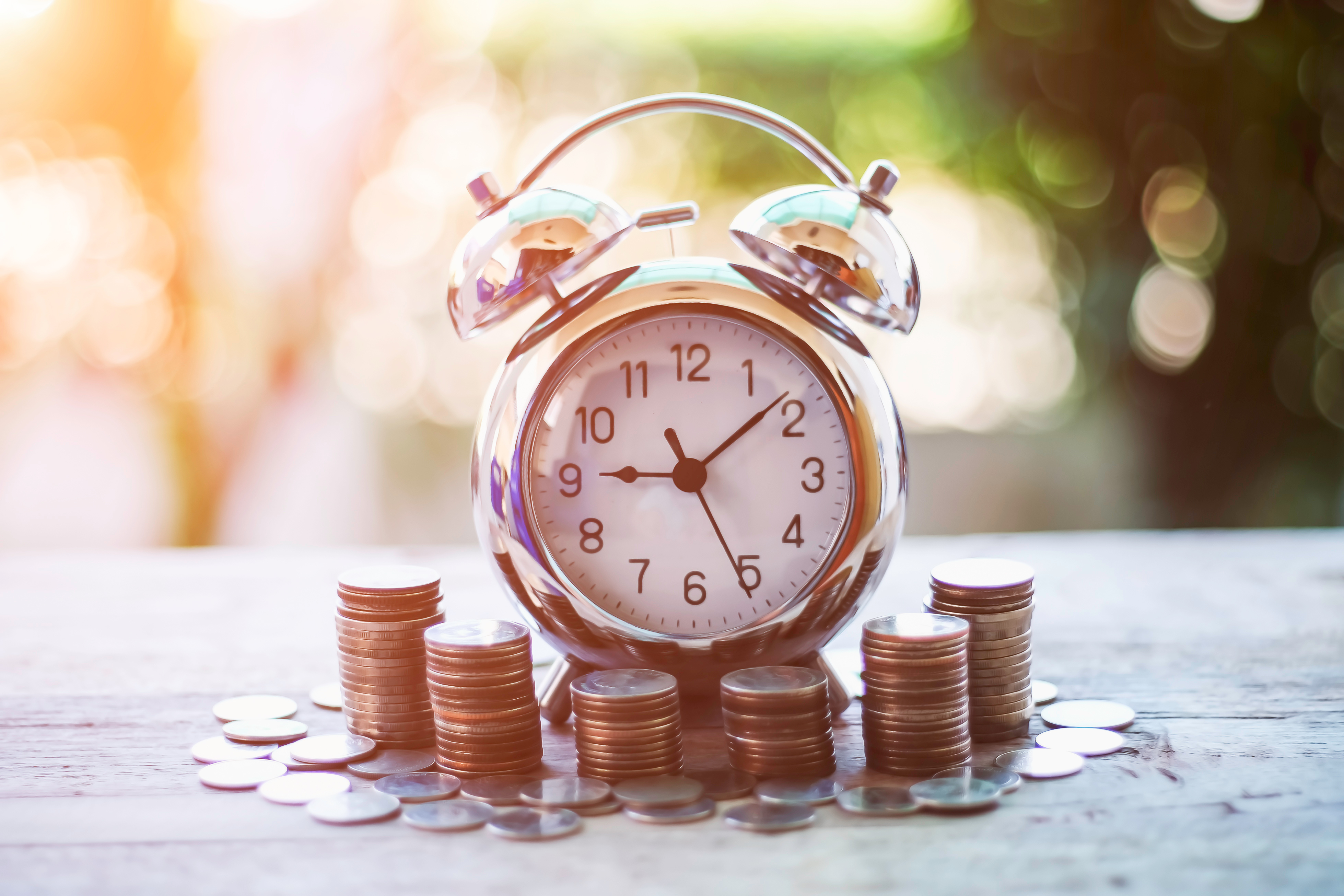 Clock surrounded by coins